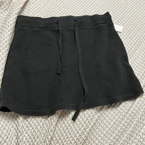 Skirt is a small brand in John Galt from PacSun. Never worn